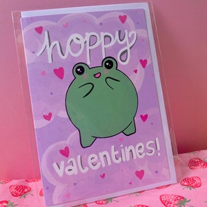 Tarjeta de San Valentín con forma de rana alegre (en blanco por dentro)