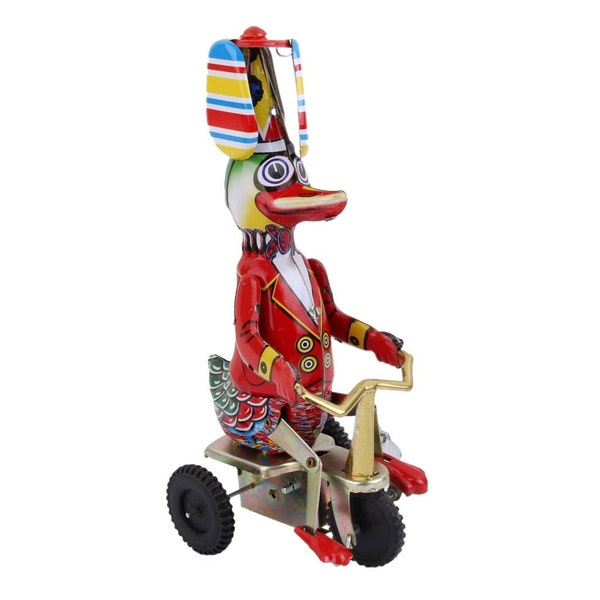 Canard de cirque vintage sur vélo Tricycle hélice chapeau rétro mécanique liquidation étain jouet collecible