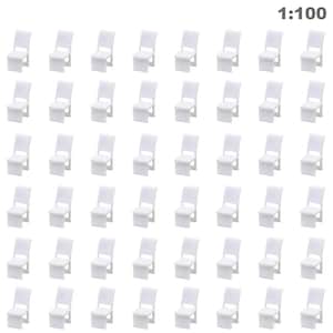 Op de afbeelding: Een verzameling kleine, witte plastic stoelen, gerangschikt in rijen. Elke stoel heeft een zitting en een gebogen rugleuning. De afbeelding bevat de tekst "1:100" in de rechterbovenhoek, wat de schaal van de stoelen aangeeft.