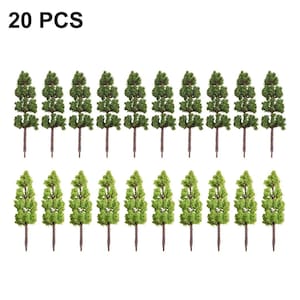 May include: Twenty miniature artificial trees with green foliage and brown stems are arranged in two rows. The text "20 PCS" is in the upper left corner. These small trees are suitable for model train sets, dioramas, or other craft projects.