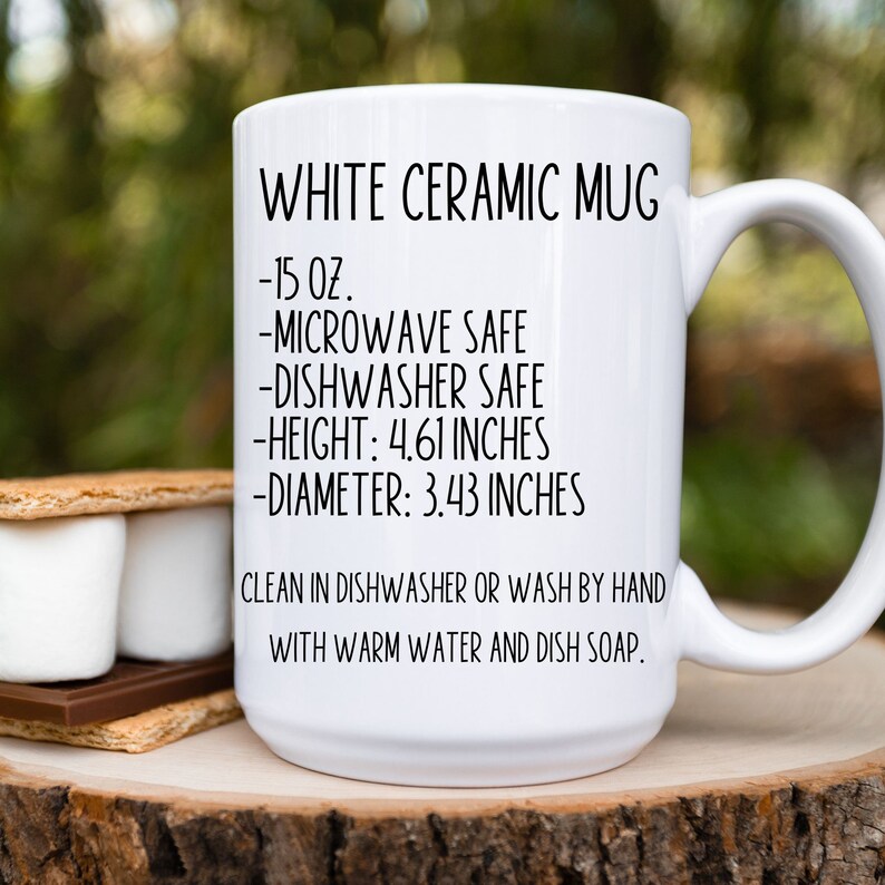 May include: White ceramic mug with black text that reads "WHITE CERAMIC MUG", "15 oz.", "MICROWAVE SAFE", "DISHWASHER SAFE", "HEIGHT: 4.61 INCHES", "DIAMETER: 3.43 INCHES", "CLEAN IN DISHWASHER OR WASH BY HAND WITH WARM WATER AND DISH SOAP."