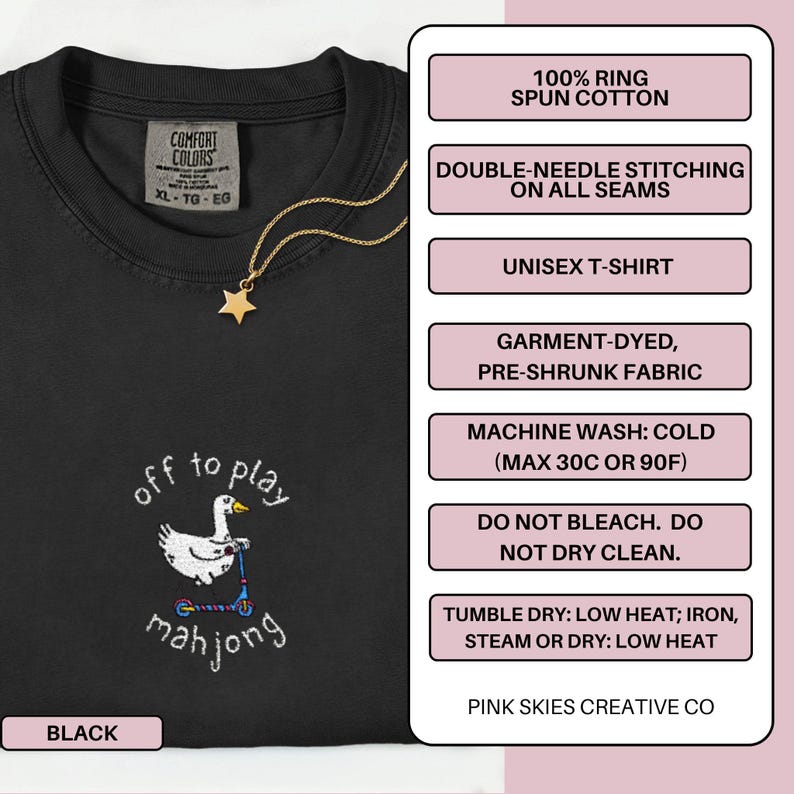 May include: Black unisex t-shirt with embroidered design. The design features a white duck on a scooter with the words "off to play mahjong". The shirt is made of 100% ring spun cotton and has double-needle stitching on all seams.