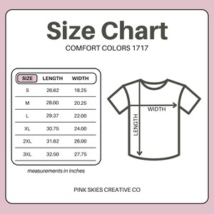 May include: A size chart for Comfort Colors 1717 t-shirts, with measurements in inches. The chart includes sizes S through 3XL, with length and width dimensions. A diagram of a t-shirt illustrates length and width measurements. The text "PINK SKIES CREATIVE CO" is at the bottom.