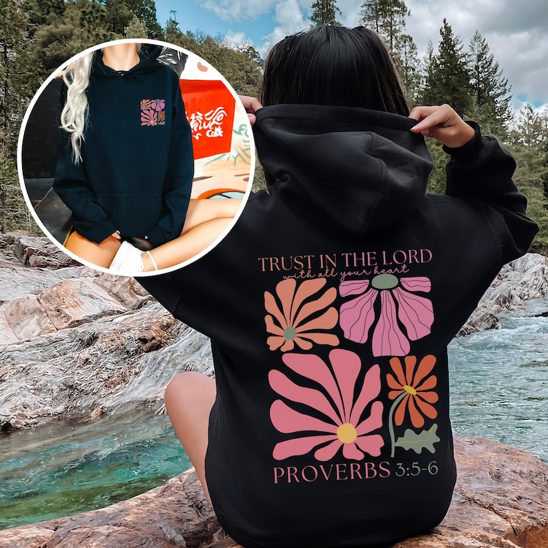 May include: Black hoodie with a floral design and the text "TRUST IN THE LORD with all your heart" and "PROVERBS 3:5-6".