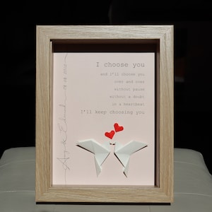 May include: A framed print with a pink background and white origami birds. The print features the text "I choose you and I'll choose you over and over without pause without a doubt in a heartbeat I'll keep choosing you".