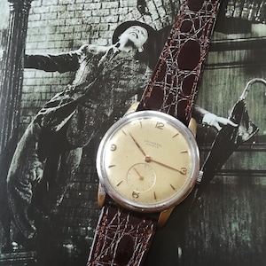 Universal watches vintage on sale