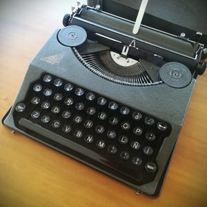 1936 Hermes Baby vintage typewriter, working and serviced