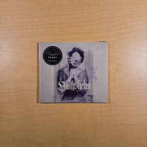 May include: A black and white album cover with a woman's face partially obscured by a white cloth. The album title "Bathsheba" is written in a gothic font.