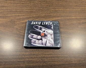 David Lynch: Crazy Clown Time, CD antiguo, copia de biblioteca en excelente estado y se reproduce perfectamente de principio a fin.