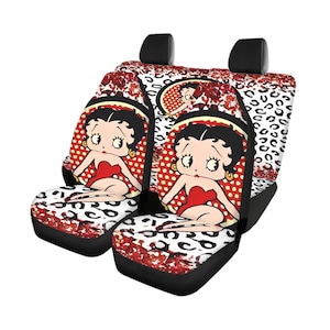 Puede incluir: Dos fundas para asientos de coche con un diseño de dibujos animados de Betty Boop. La imagen principal es de Betty Boop con un vestido rojo, sobre un fondo de lunares rojos. Los asientos tienen un diseño de estampado de leopardo en blanco y negro con acentos rojos.