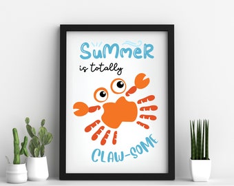 May include: A framed print with a colorful illustration of a crab and the text "Summer is totally claw-some".