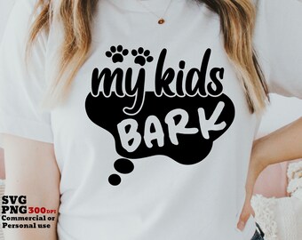 May include: White t-shirt with black text that reads "my kids bark" in a speech bubble with paw prints above the text.