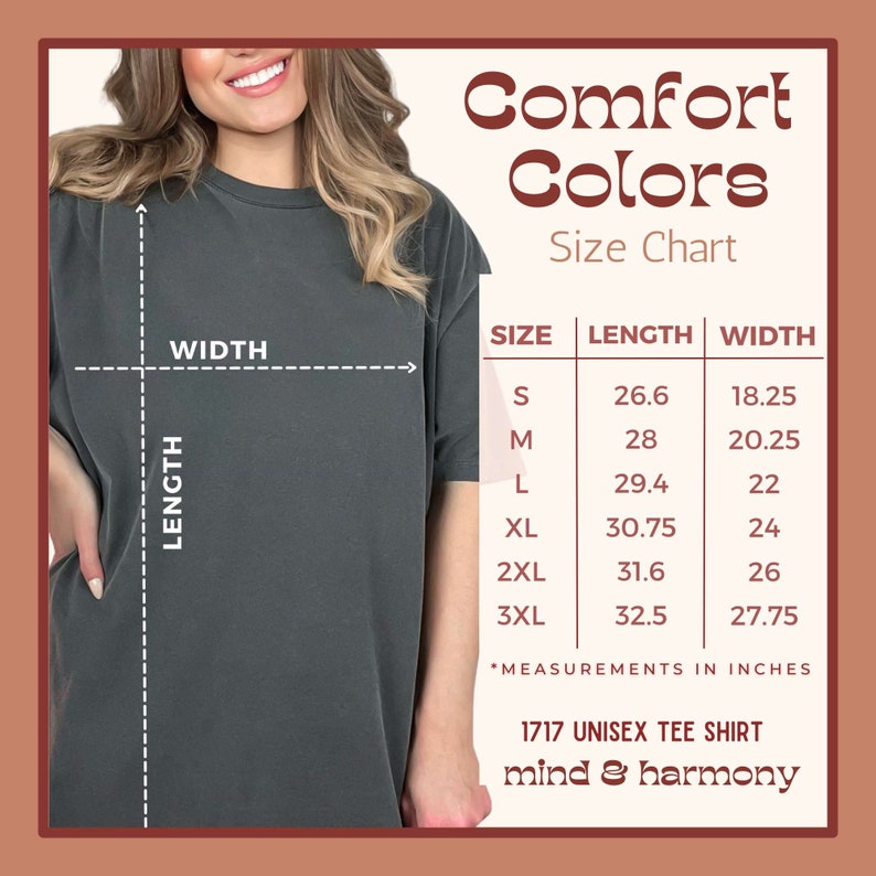 May include: A size chart for a Comfort Colors 1717 unisex tee shirt, with measurements in inches. The chart shows sizes S through 3XL, with length and width dimensions. The shirt is a dark gray color. The brand name "mind & harmony" is also visible.