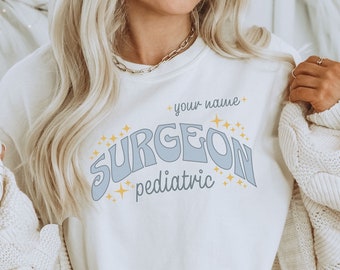Custom Pediatric Surgeon T Shirt, Personalized Children's Surgeon Gift Team Squad Stars Graphic Tshirt Comfort Colors Top Pediatrician Brain