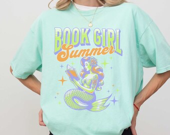 Sommerliches T-Shirt für Bücherwürmer in angenehmen Farben, Meerjungfrauen-Leseshirt