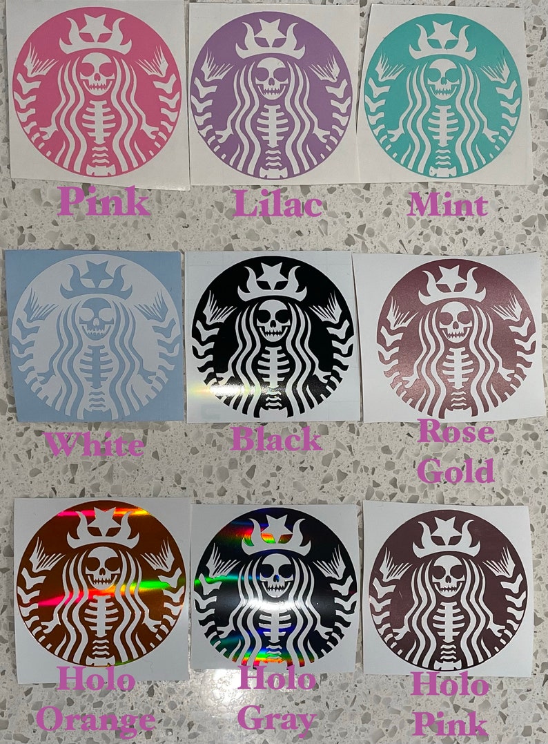 May include: Nine different coloured stickers featuring a skeleton with a crown and a mermaid tail, in the style of the Starbucks logo. The colours are pink, lilac, mint, white, black, rose gold, holographic orange, holographic grey, and holographic pink.