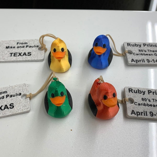 3D printed mini-micro ducks.  Multi-colored 3D printed cruise ducks with 3D printed tags.  Set of 4 ducks with customized tags.