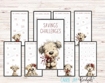 Può includere: Sfide di risparmio stampabili con illustrazioni di cuccioli. Ogni stampabile ha un obiettivo di risparmio diverso, da 45€ a 210€. Il testo "Savings Challenges" è ben visibile.
