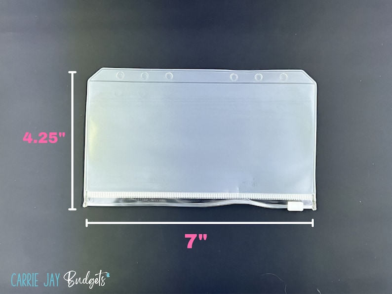 May include: Clear plastic zippered pouch with six holes along the top edge. The pouch measures 7 inches wide by 4.25 inches tall.