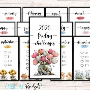 May include: A collection of framed prints with the text "2026 Friday Challenges" and monthly titles. Each print features a watercolor floral design and a price tag. The prints are arranged on a wooden surface.