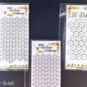 May include: Three printable savings challenge sheets with a bee and sunflower theme. The first sheet is a 100 envelope challenge with a honeycomb pattern and numbers 1 to 200. The second sheet is a 100 envelope challenge with a honeycomb pattern and numbers 1 to 75. The third sheet is a 30 day savings challenge with a honeycomb pattern and dollar amounts.