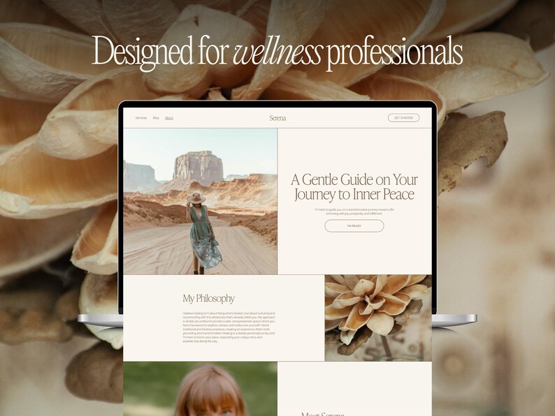 May include: A laptop displaying a website with the text "Designed for wellness professionals" and "A Gentle Guide on Your Journey to Inner Peace." The website features images of a desert landscape and a woman in a dress. The laptop is set against a blurred, neutral-toned background.