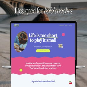 May include: A laptop screen shows a website with a purple and pink colour scheme. The text on the screen says "Life is too short to play it small." The website also features the words "Designed for bold coaches."