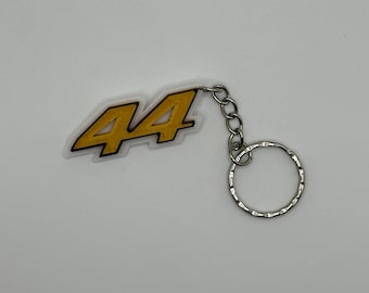 Llavero/accesorio con número de conductor de F1 impreso en 3D
