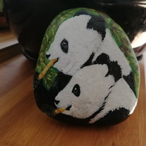 Animal acrylic paint on pebble