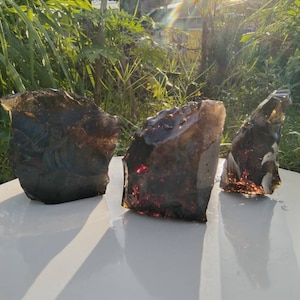 3 pcs 2255 gr of rough andara crystal black yellow and fiber inside