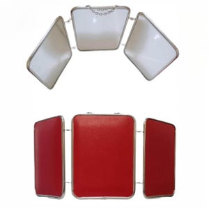 Red tri-fold dressing-table screen with chain — 1960s–70s