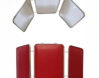 Red tri-fold dressing-table screen with chain — 1960s–70s