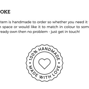 May include: Black and white illustration of a stamp with the text "100% Handmade with Love" and a heart in the center.