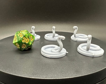 Miniaturas de serpientes venenosas gigantes de D&D