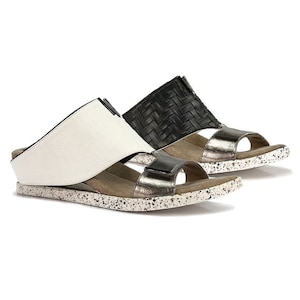 Modzori Women’s Kleo Reversible Vegan Wedge Sandal - White flips to Black