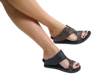 Modzori Women’s Asta Reversible Vegan Wedge Sandal - Metallic flips to Black