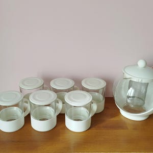 Vintage 6-person tea set in glass and white plastic