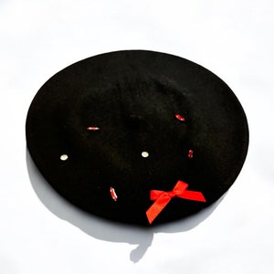 Black Beret with Rhinestones and a Red Bow