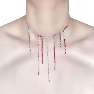 Bloeddruppelketting met rode kralen