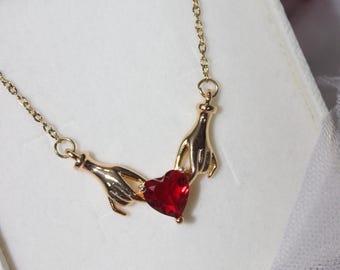 Gold Hands Holding Heart Necklace – Red Crystal Heart Pendant, Dainty Romantic Jewelry, Love Gift for Her