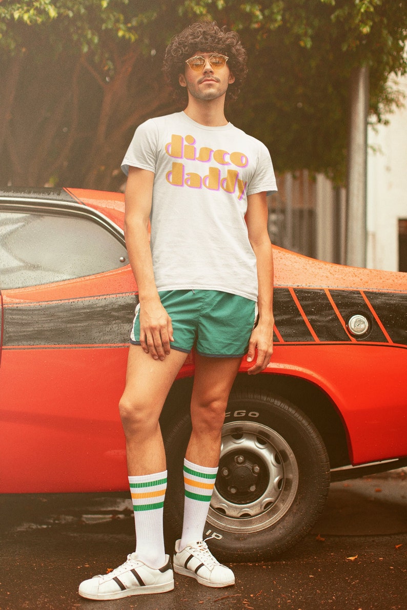 1970s Men’s Outfit Inspiration | Costumes Ideas     Disco Daddy - 70s Womens Clothing - Catch Phrase T Shirt - Trendy Graphic Tee - Vintage Aesthetic - Unisex - Vintage Print - 70s Fashion  AT vintagedancer.com