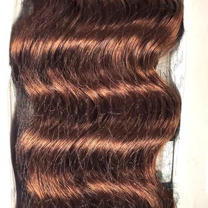 100% human hair tangle-free weave; Italian Hi body; curly; weft; sew-in; for women.
