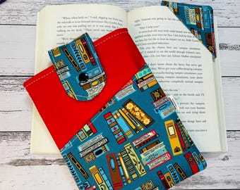 Handmade padded book sleeve to protect your paperback, hardcover or e-reader, for readers who take their books everywhere. Bookish design