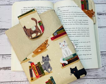 Handmade padded book sleeve to protect your paperback, hardcover or e-reader, for readers who take their books everywhere. Cat print