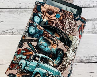 Handmade padded book sleeve to protect your books or e-reader, for readers who take their books everywhere. Floral truck design