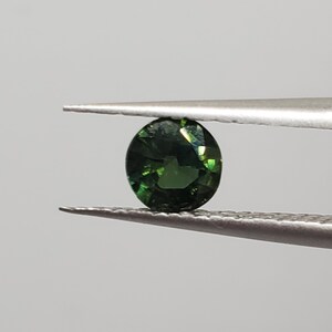 Natural Green sapphire for birthstone Jewelry designing! 0.66 carets! 5.2mm