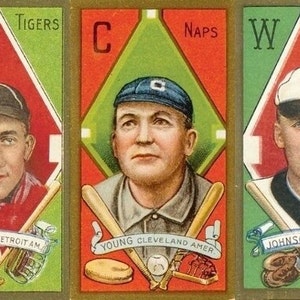May include: Three vintage baseball cards featuring Ty Cobb, a Detroit American League player,  Young, a Cleveland American League player, and Johnson, a Washington American League player. Each card features a diamond-shaped baseball field with the player's name and team printed below.