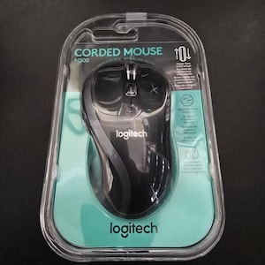 May include: A black Logitech corded mouse with a scroll wheel and buttons. The packaging says "CORDED MOUSE M500" and "Hyper-fast scroll wheel".