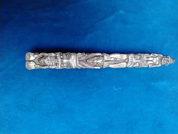 Totem pole sterling silver pin