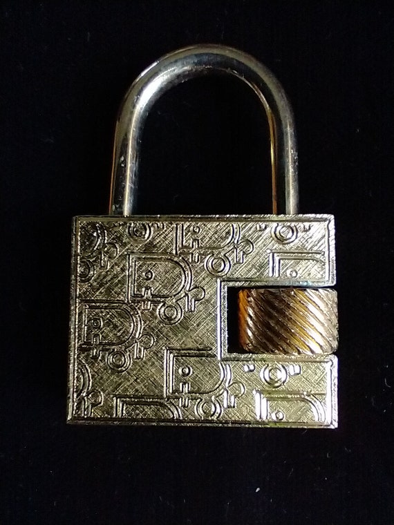 Dior screw purse lock gold tone
